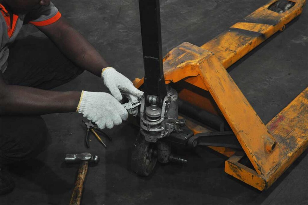 how to repair pallet jack pump